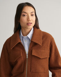 Bouclé jack met ritssluiting