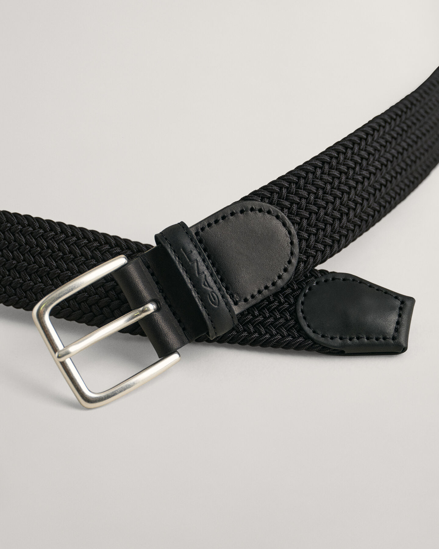 Elastische gevlochten riem