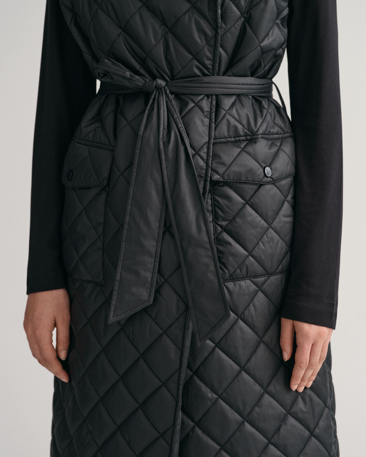 Lange gewatteerde bodywarmer