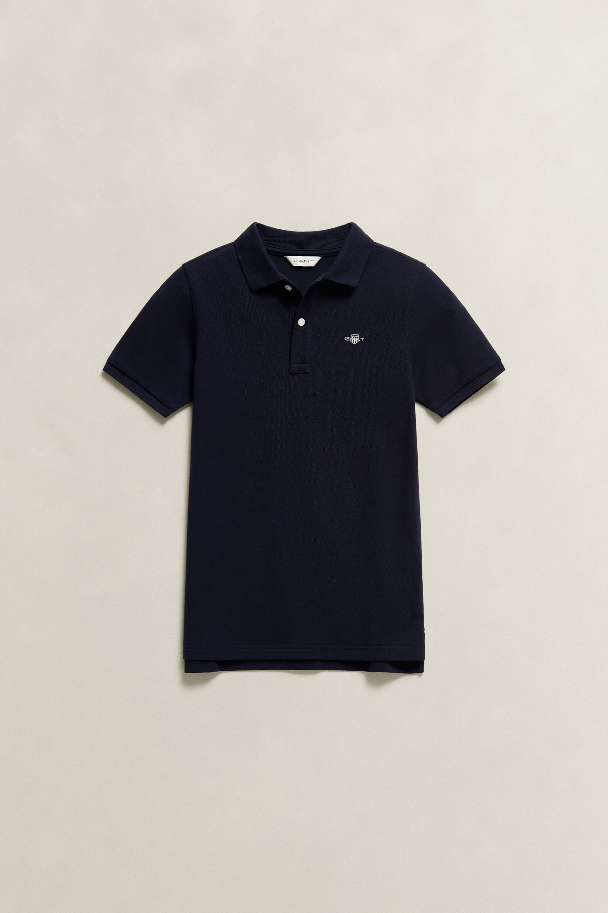 Poloshirt met schild voor tieners