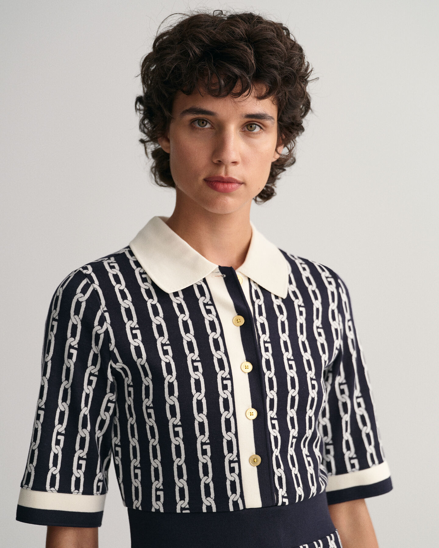 Chain jacquard polojurk met halflange mouwen