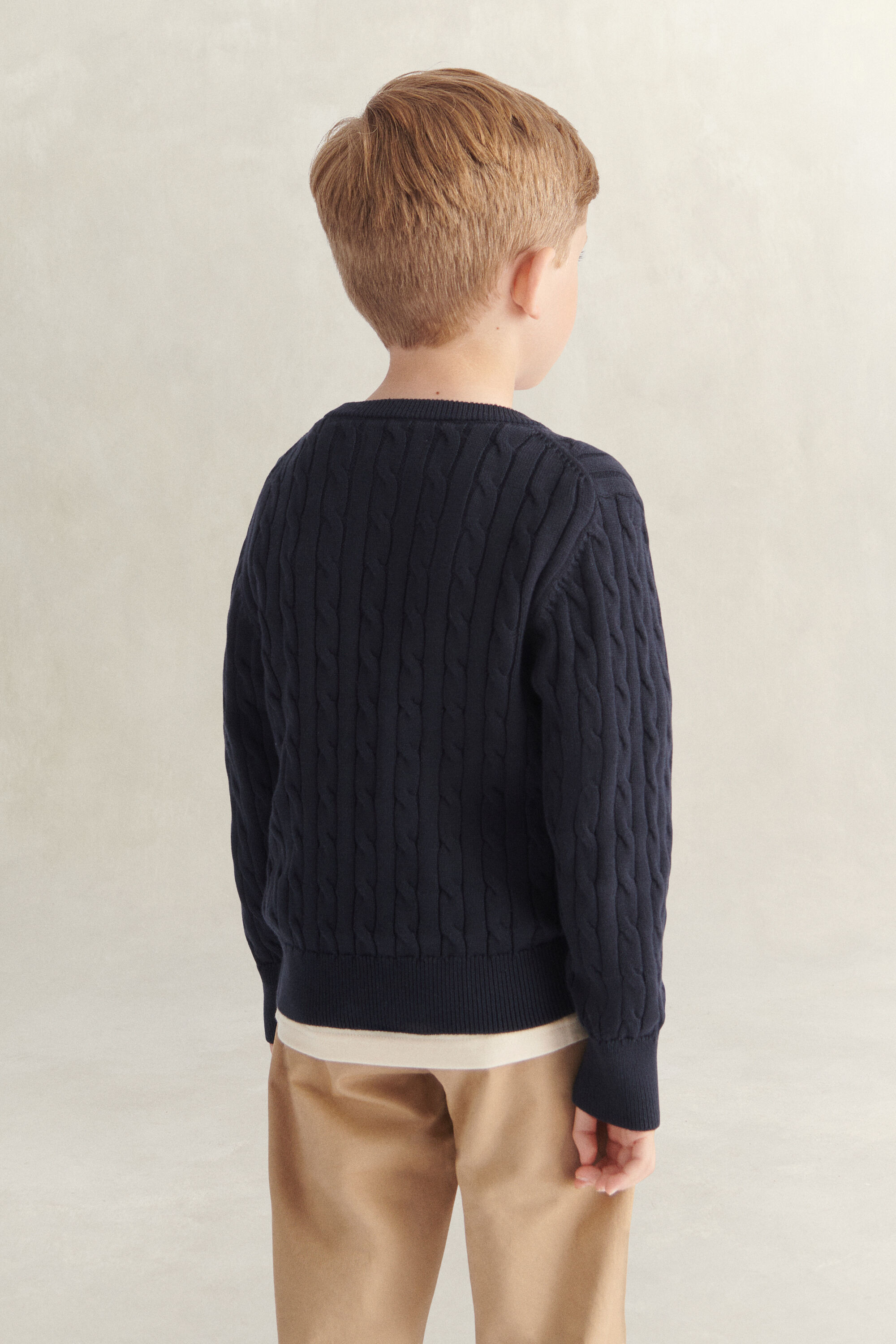 Kabeltrui met schild voor jongens