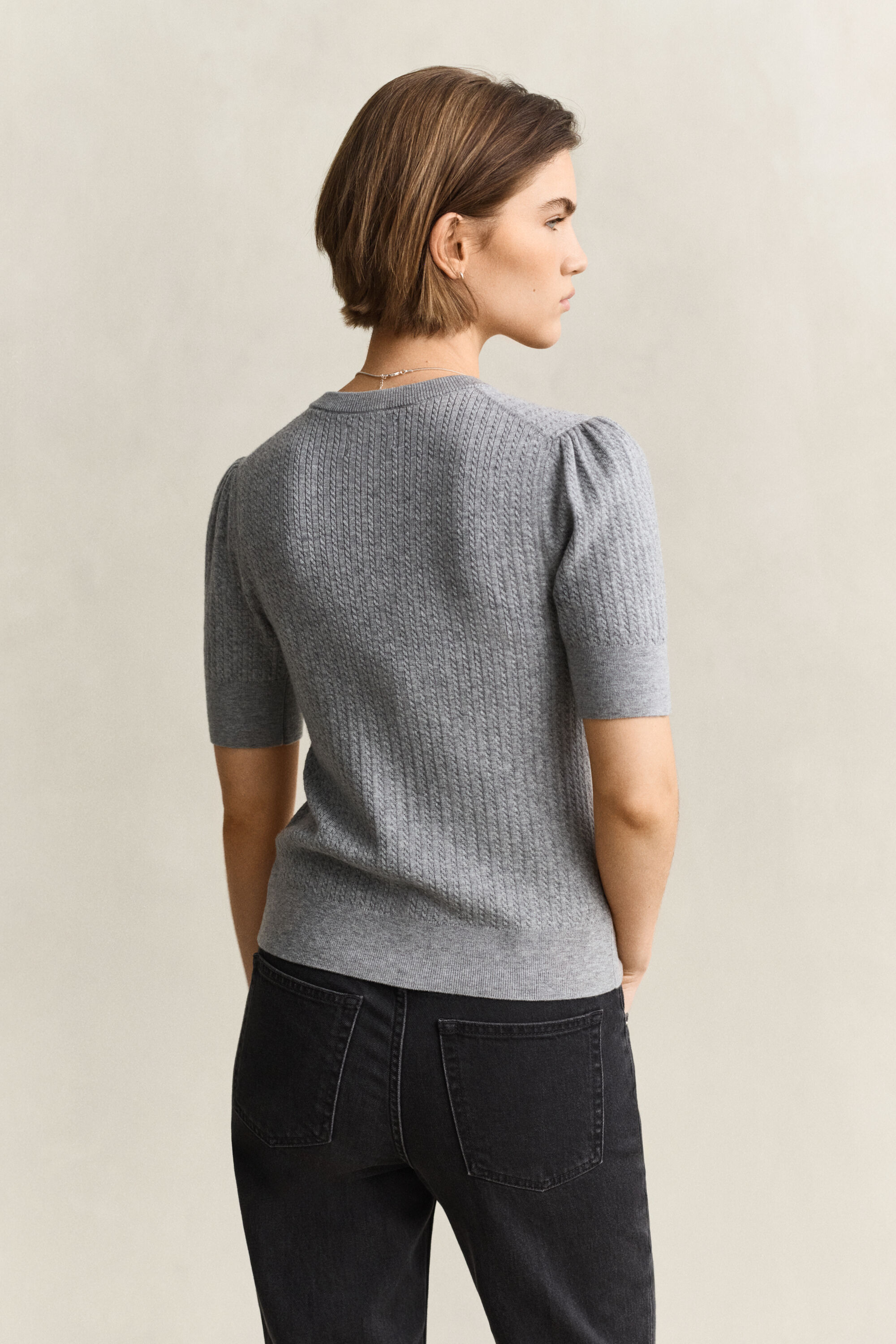 Gebreid kabelvest met korte mouwen