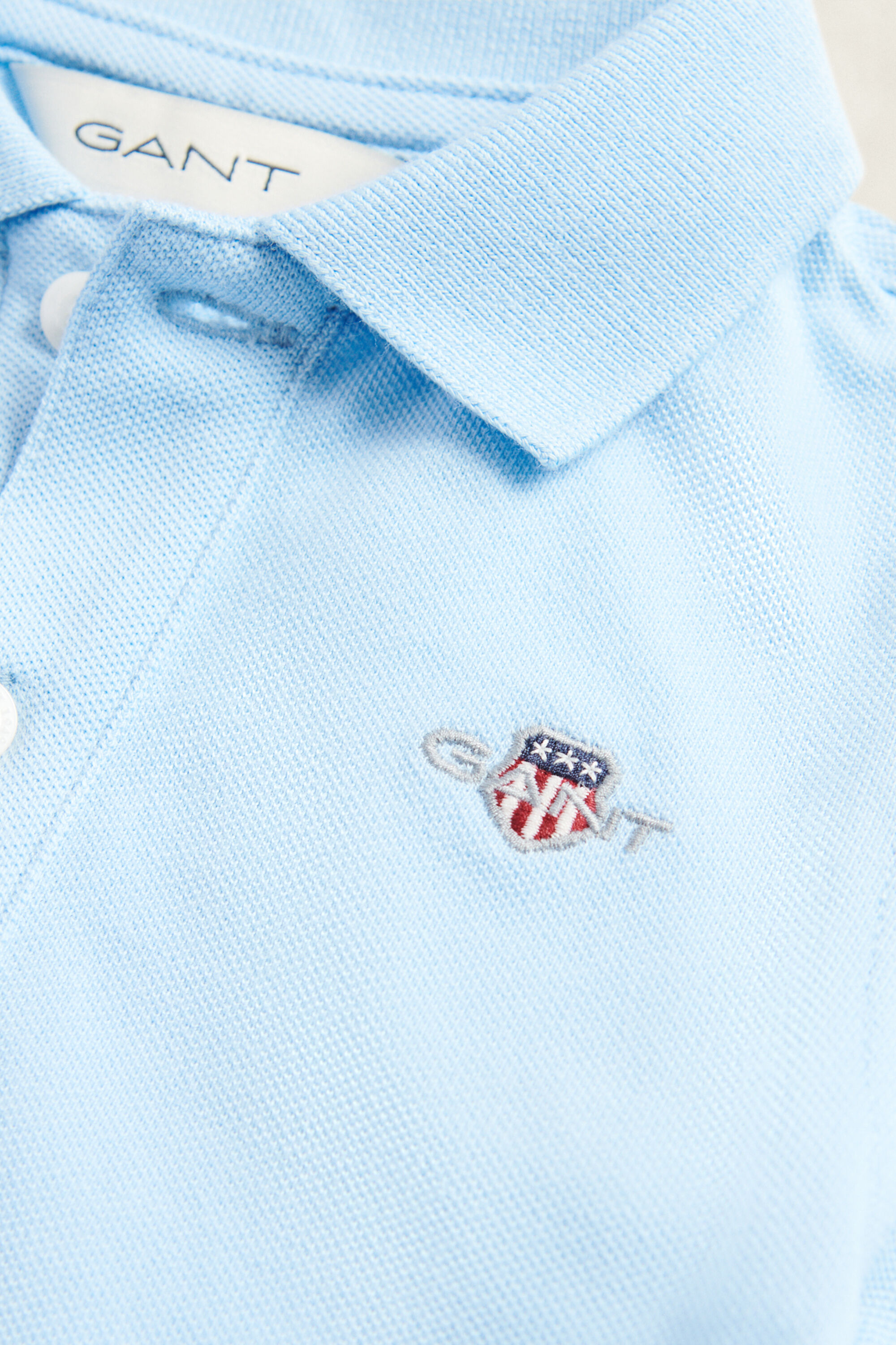 Kids Shield piqué poloshirt