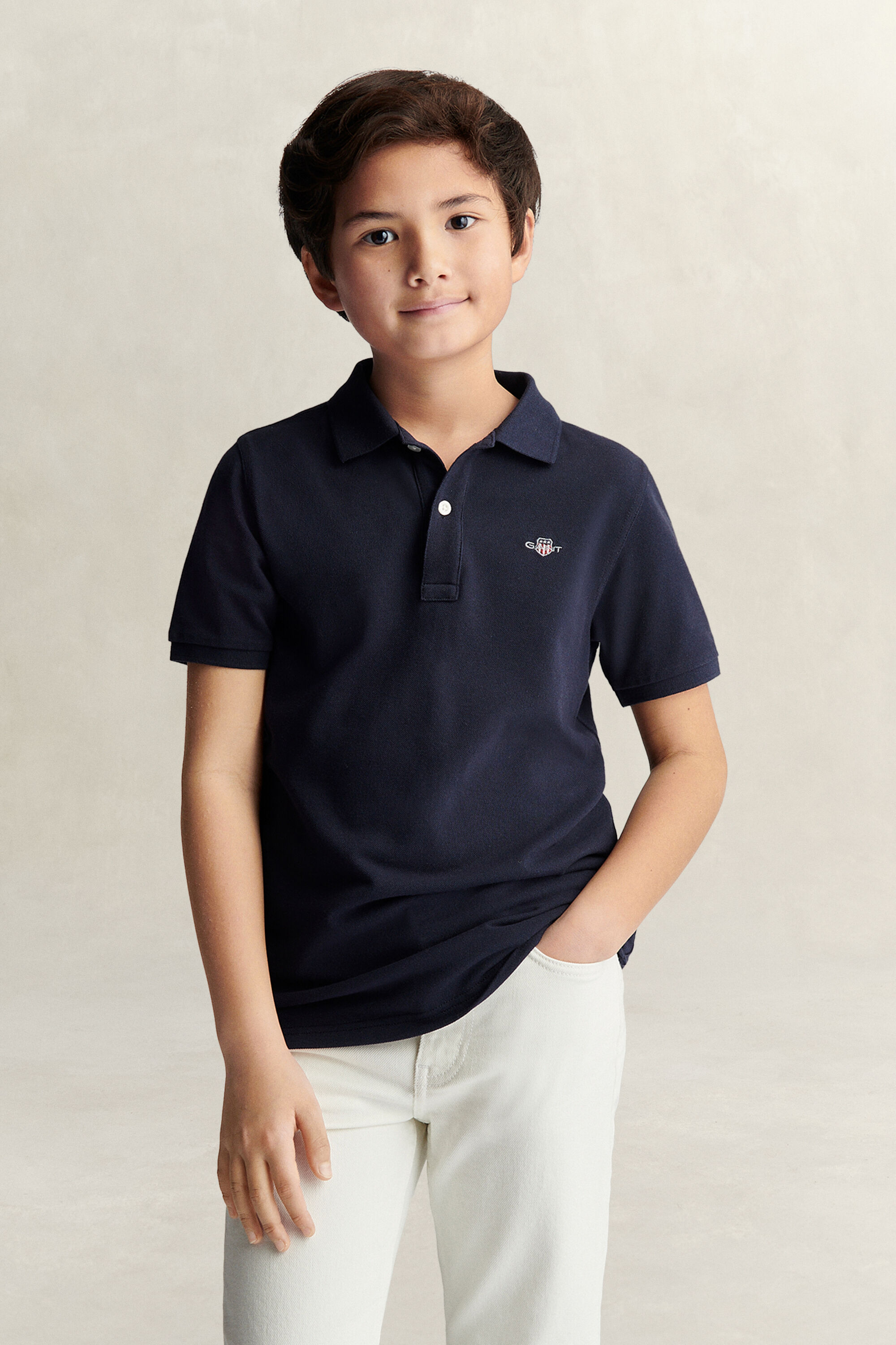 Poloshirt met schild voor tieners