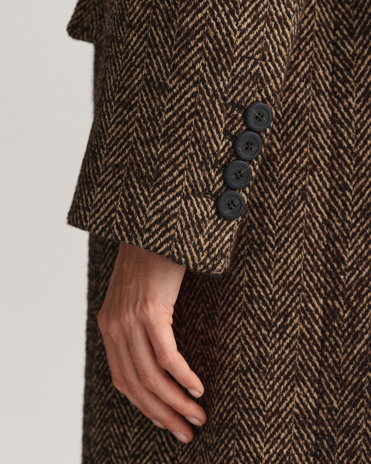 Overjas met visgraatmotief