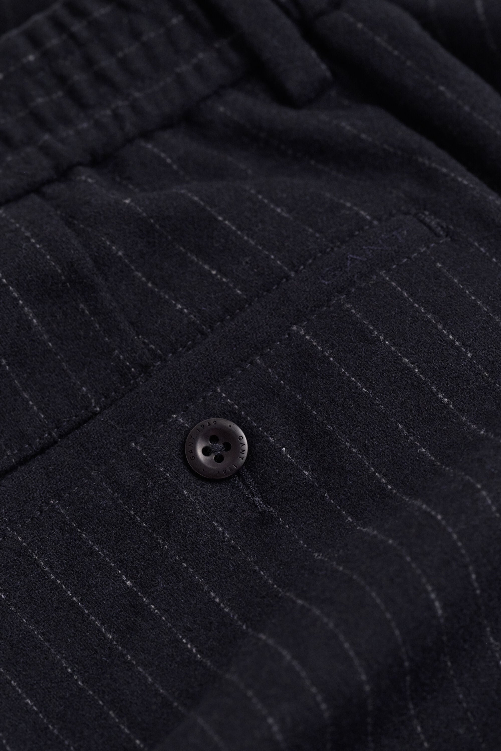 Broek van wollen flanel met taps toelopende pijpen