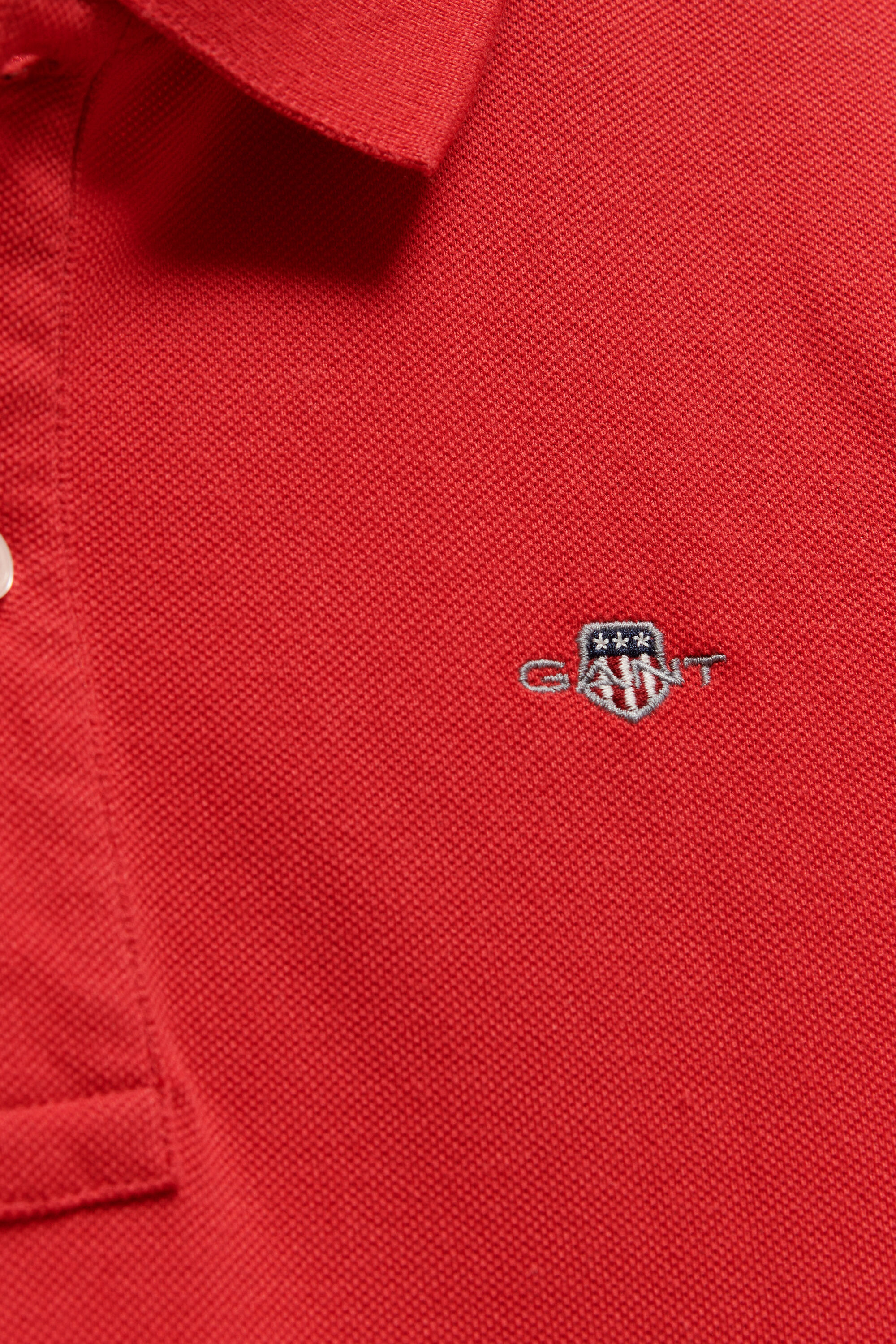 Teens Shield piqué poloshirt