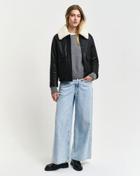 Ribgebreide trui met ronde hals