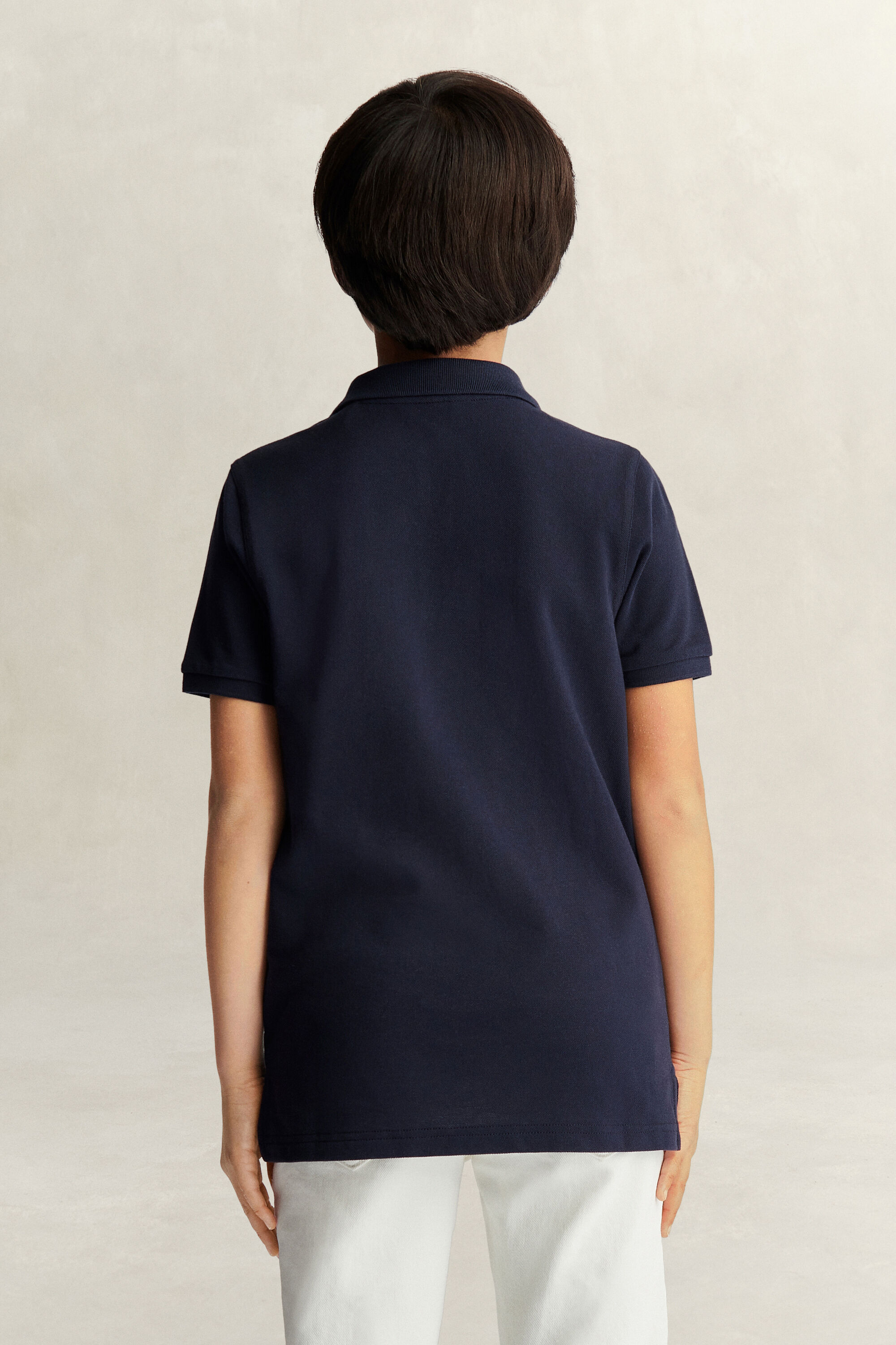 Poloshirt met schild voor tieners