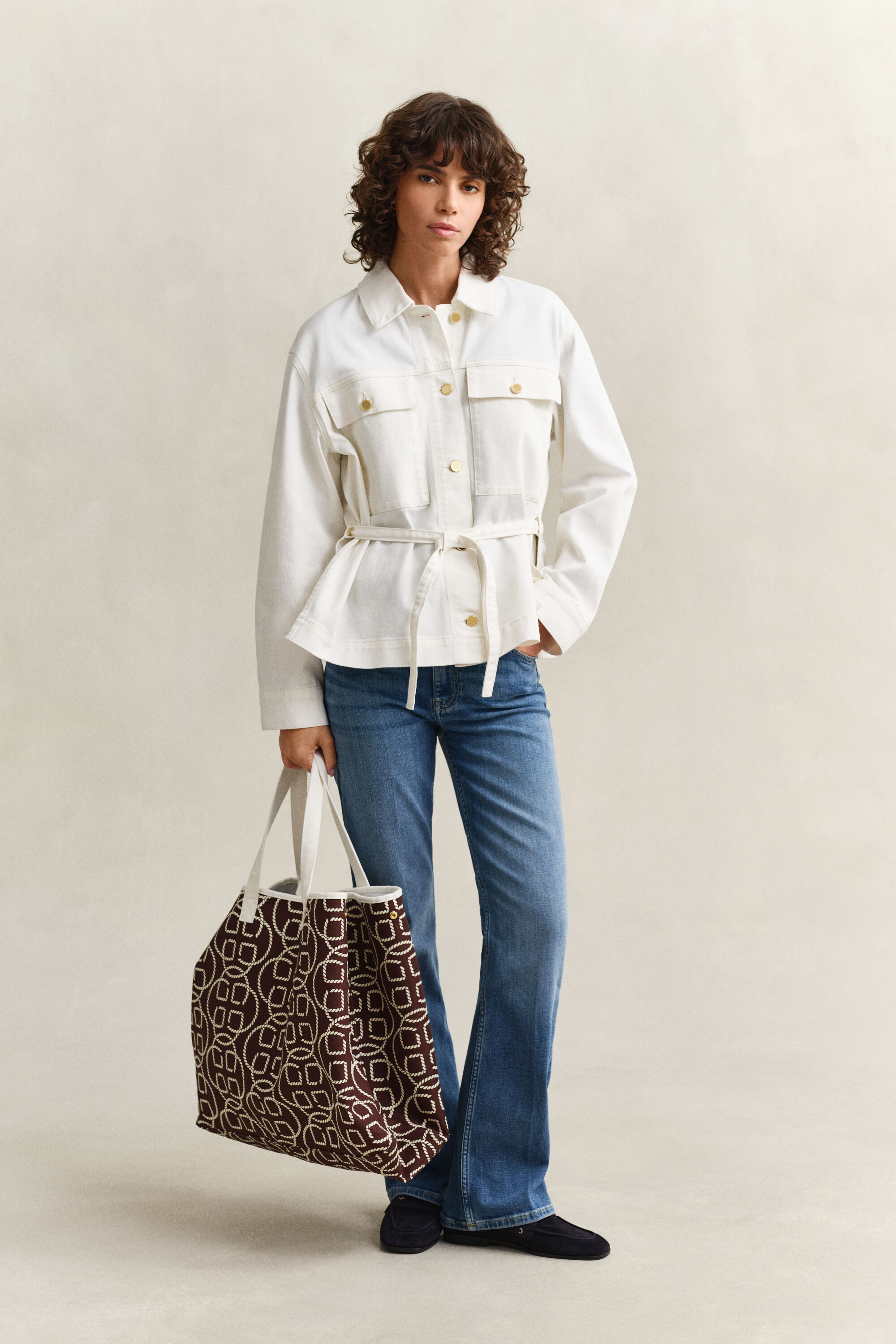 Spijkerjasje met strikdetails