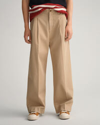 Volume chino met plooien