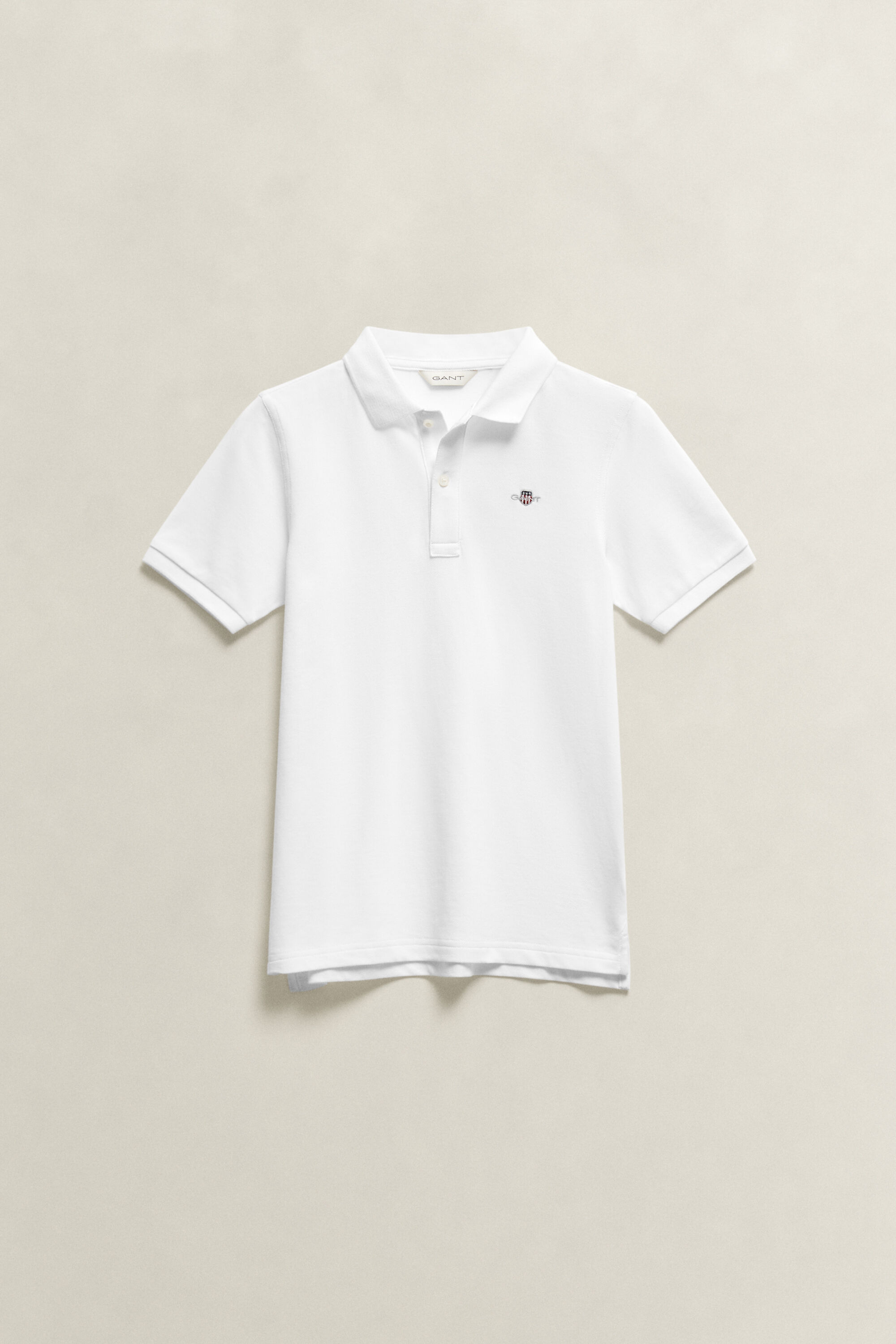Poloshirt met schild voor tieners
