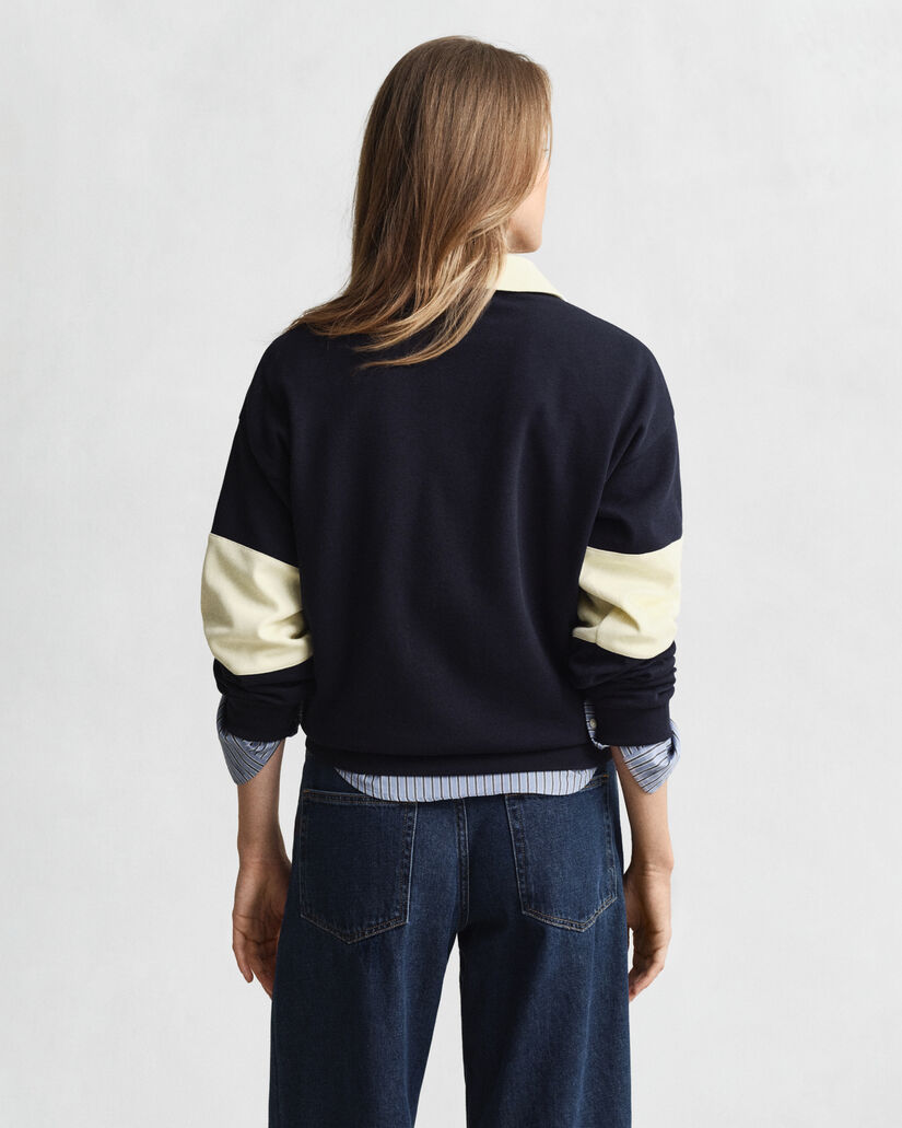 Rugger met piqué-textuur en kleurblokken