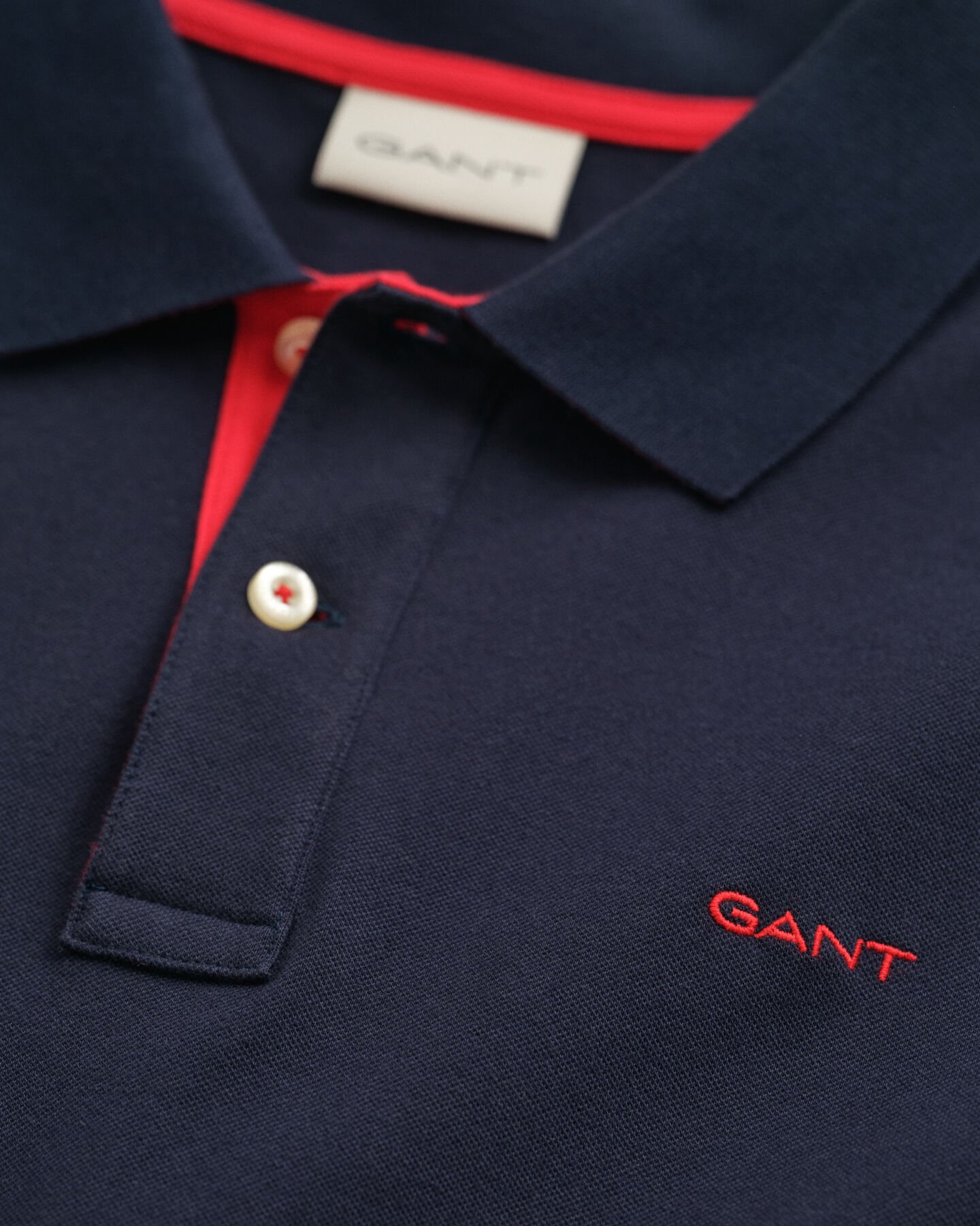 Piqué Rugger met contrasterend detail