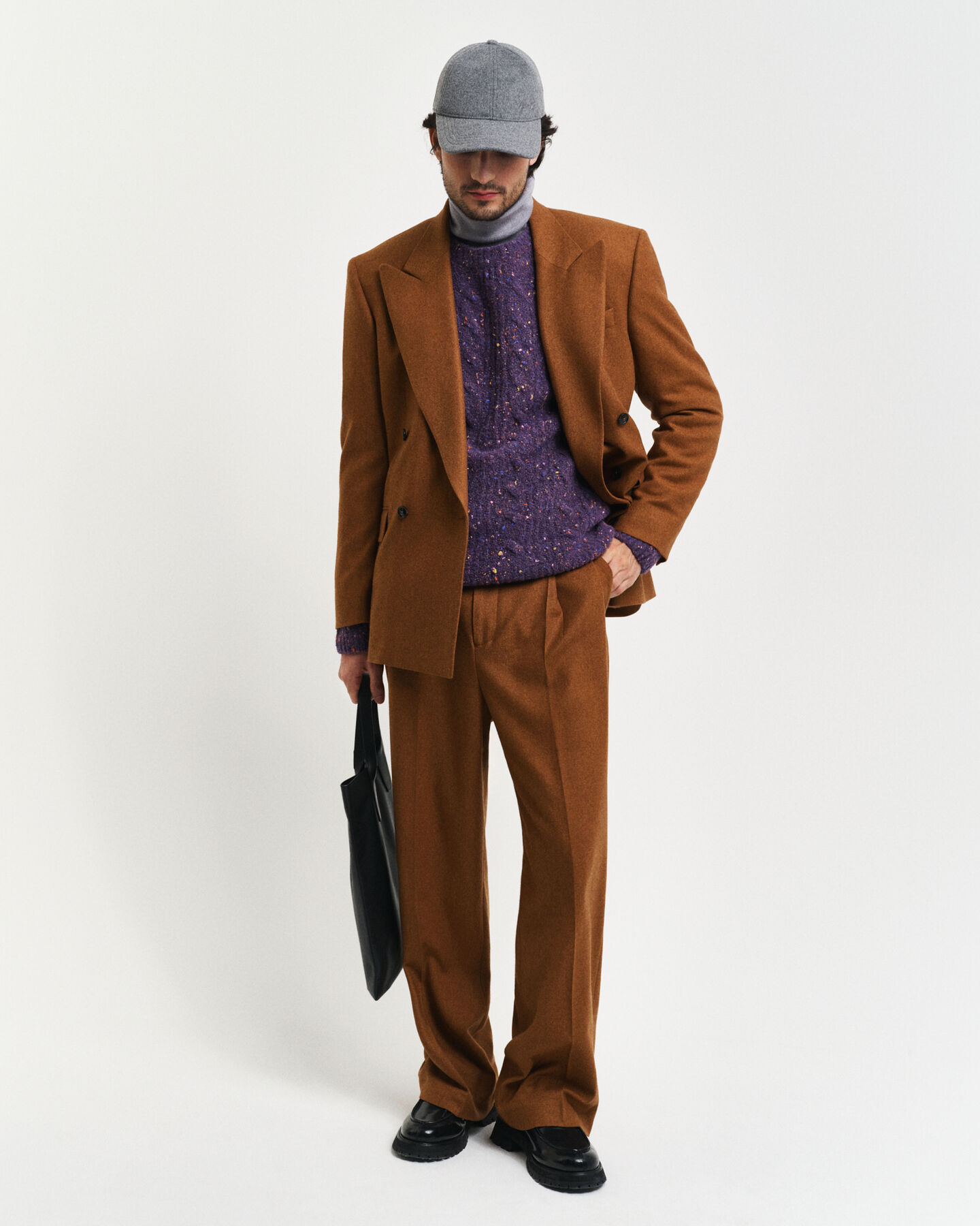 Bouclégebreide kabeltrui