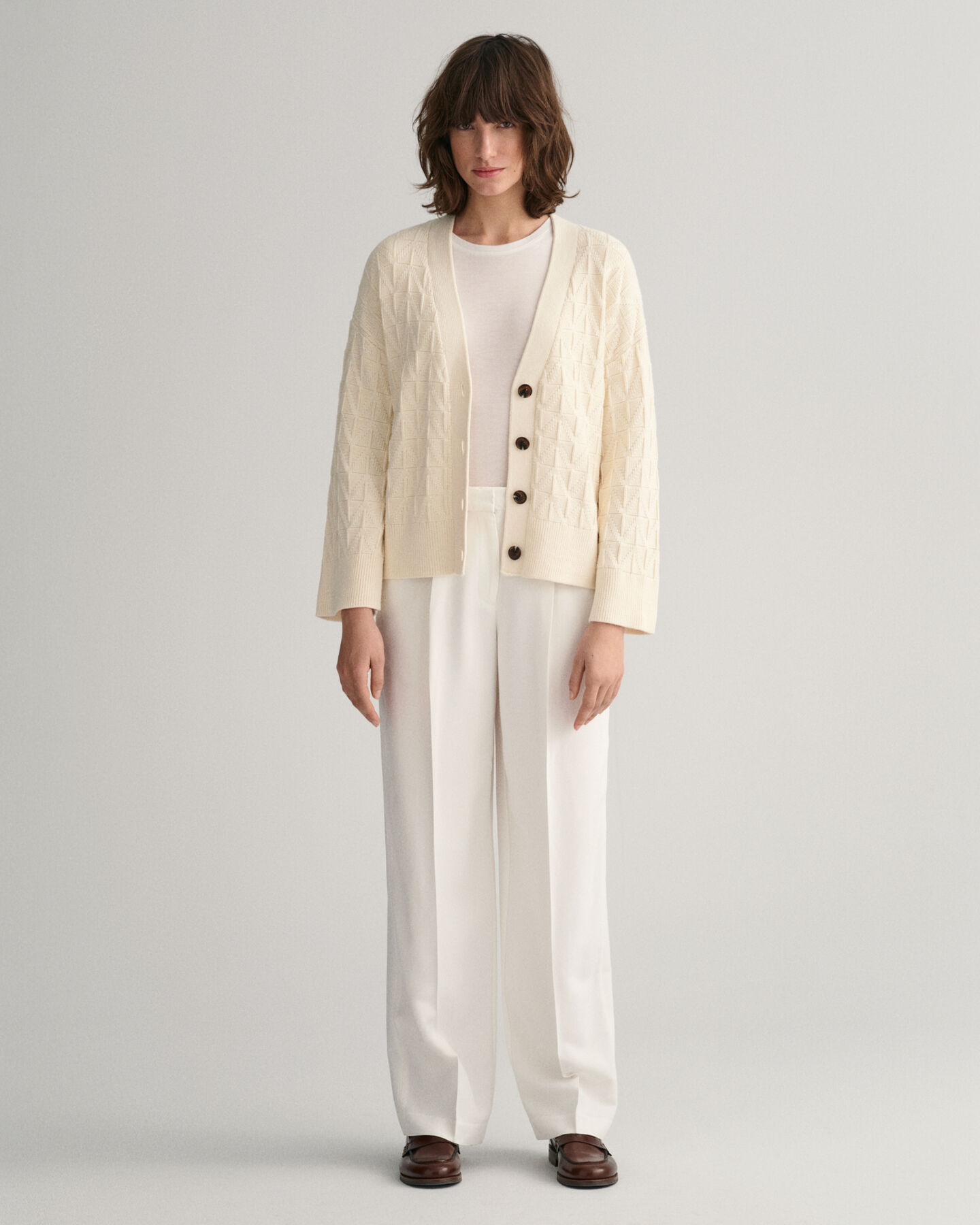 Vest met V-hals en visgraatmotief