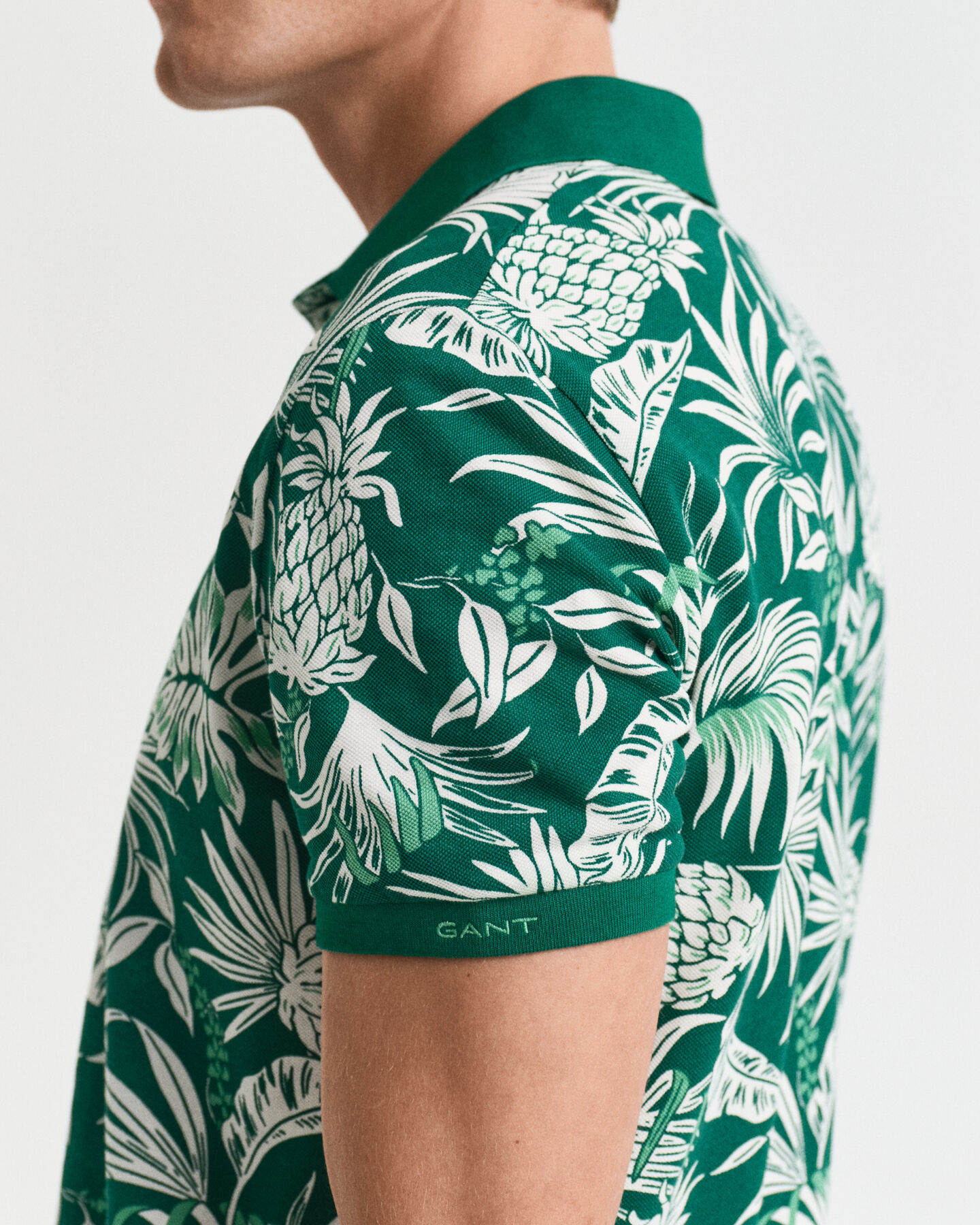 Poloshirt met tropische print