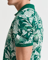Poloshirt met tropische print