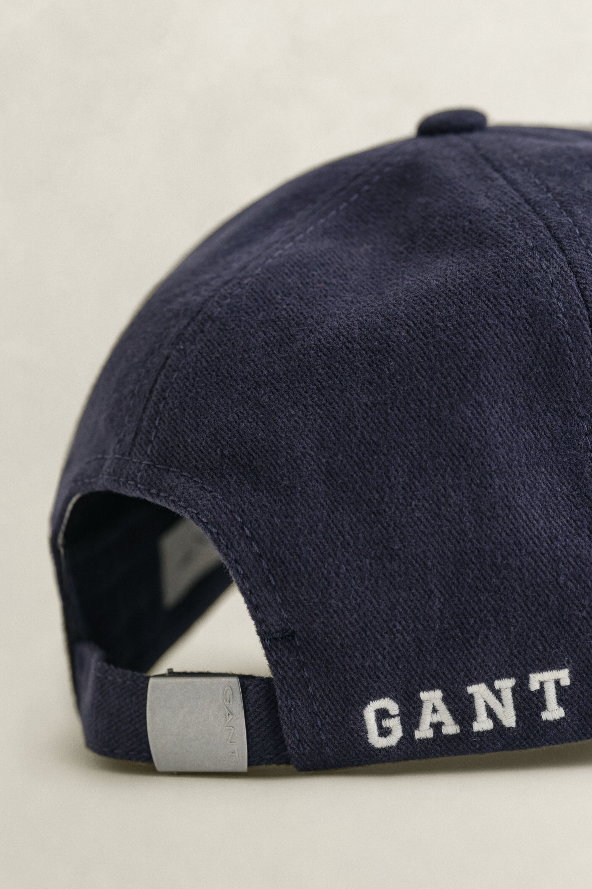 Moleskin pet met G-badge