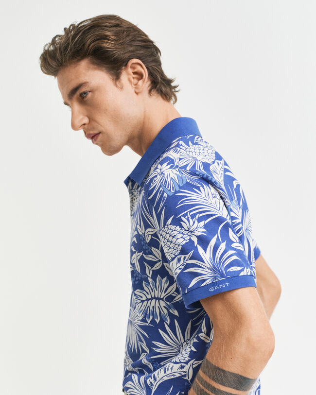 Poloshirt met tropische print