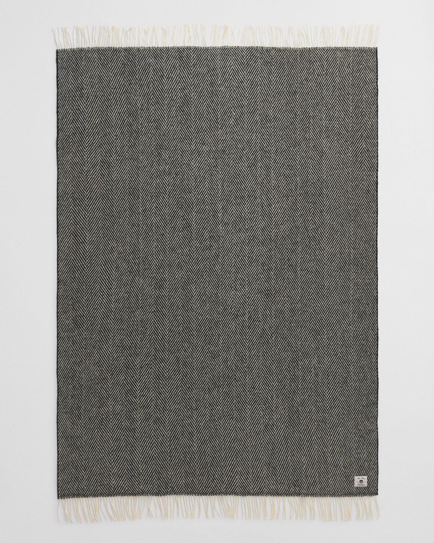 Wollen sprei met visgraatmotief