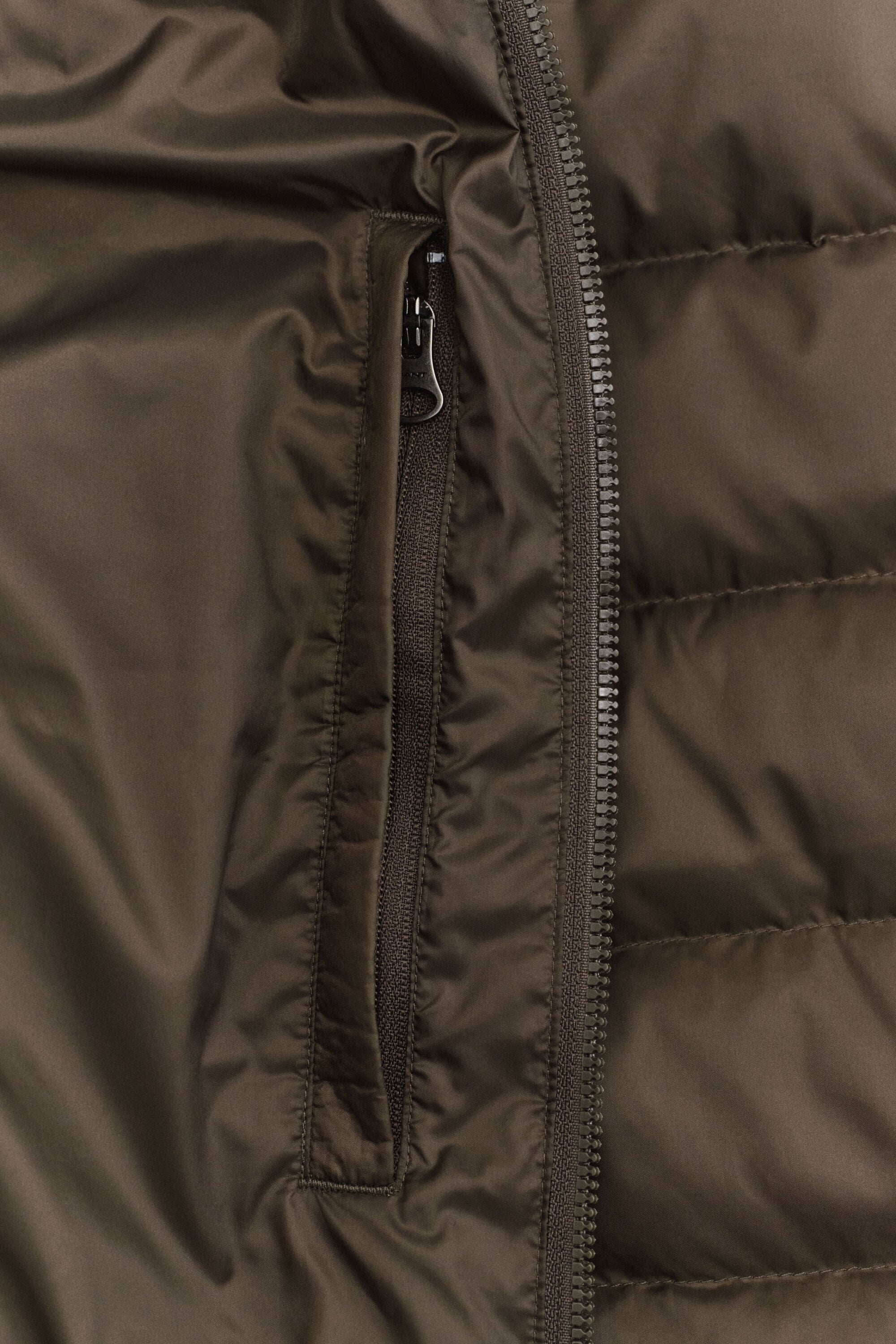 Lichte donsbodywarmer