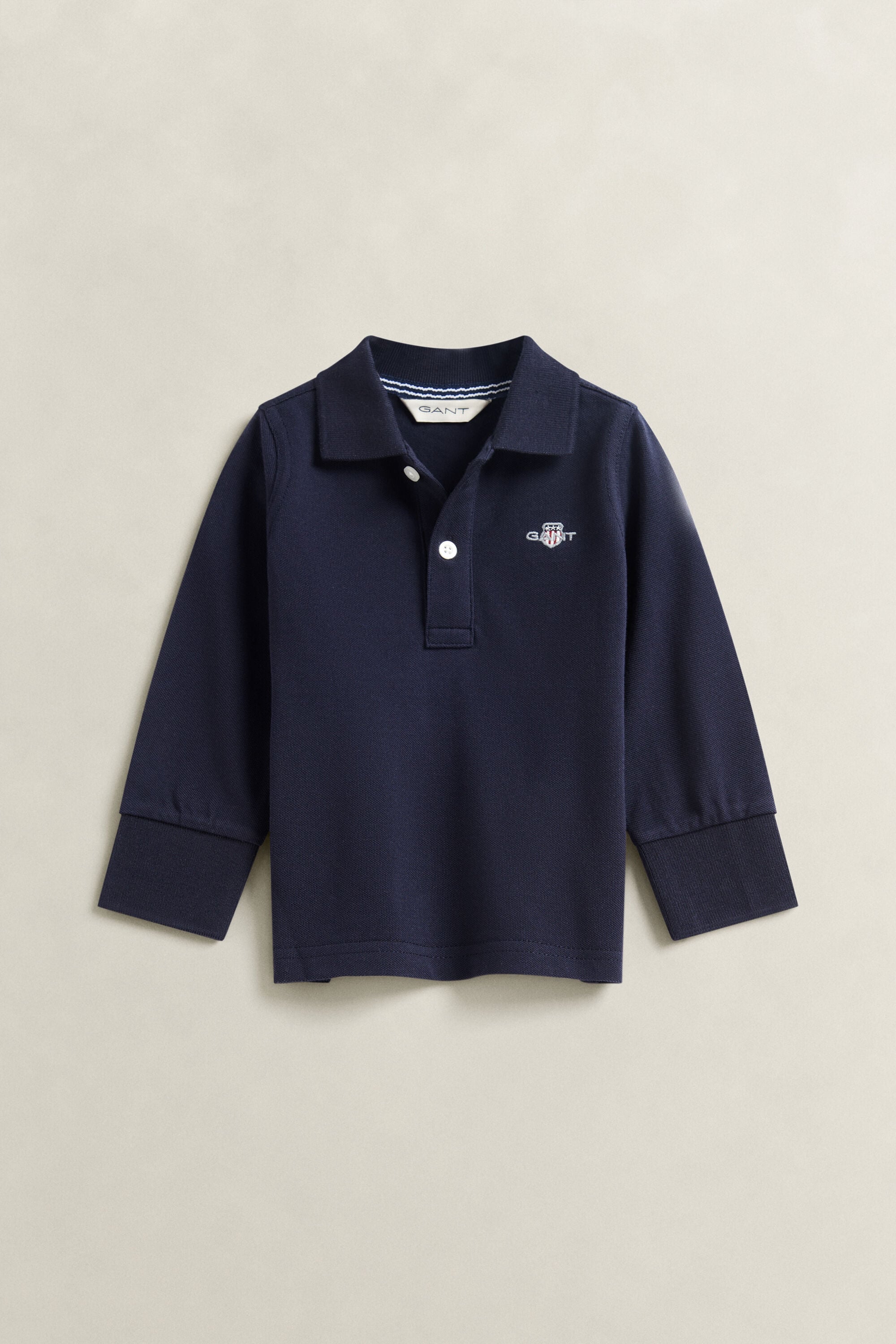 Poloshirt met lange mouwen en schild voor jongens
