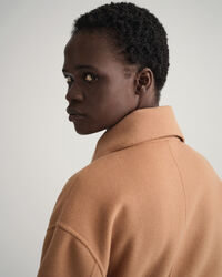 Met de hand gestikte jas met ceintuur