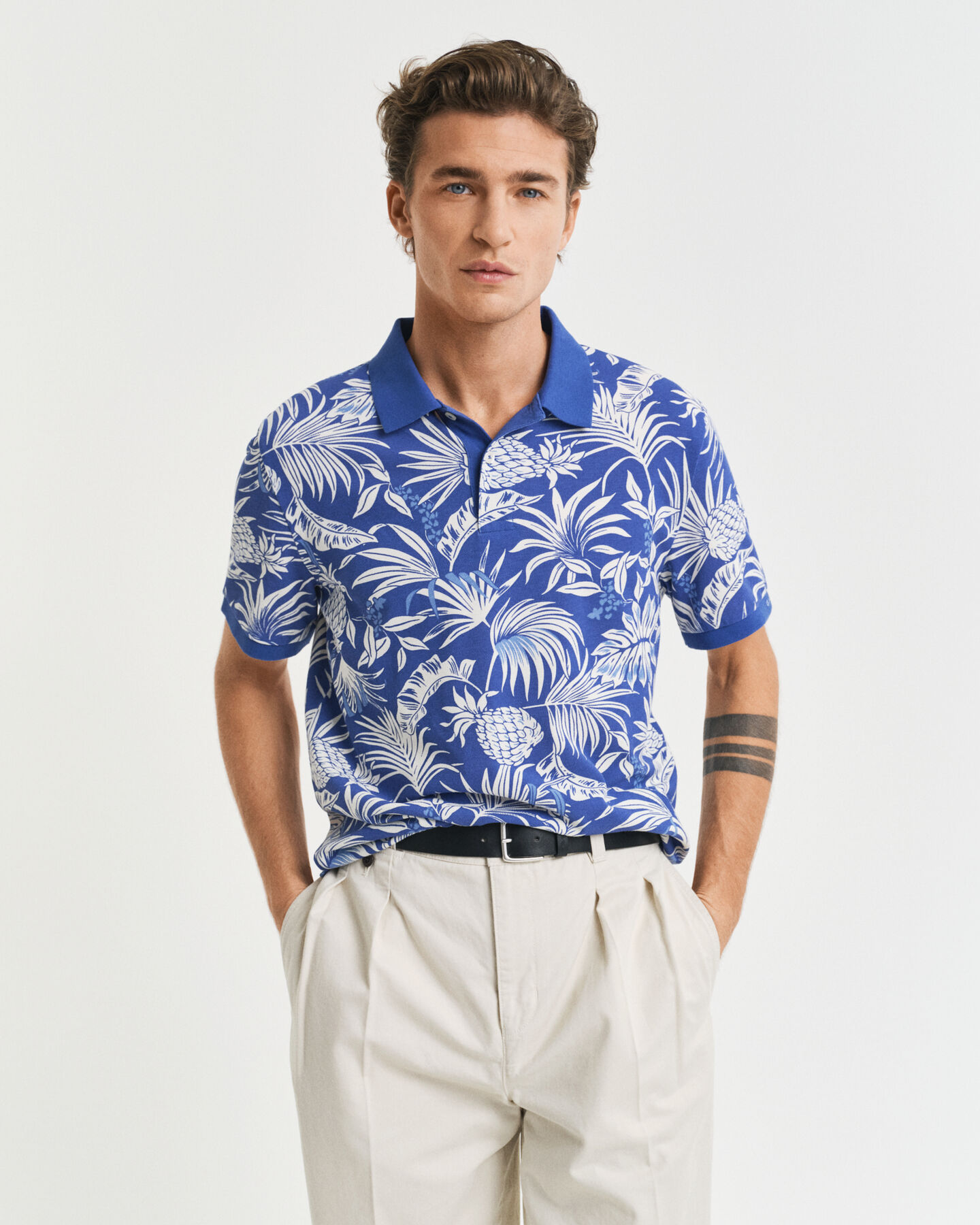 Poloshirt met tropische print