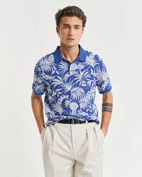 Poloshirt met tropische print