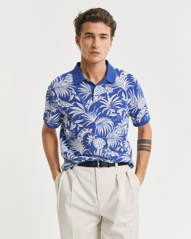 Poloshirt met tropische print