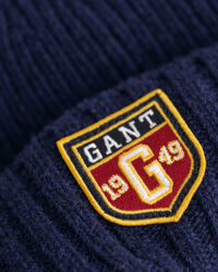 Wollen beanie met badge