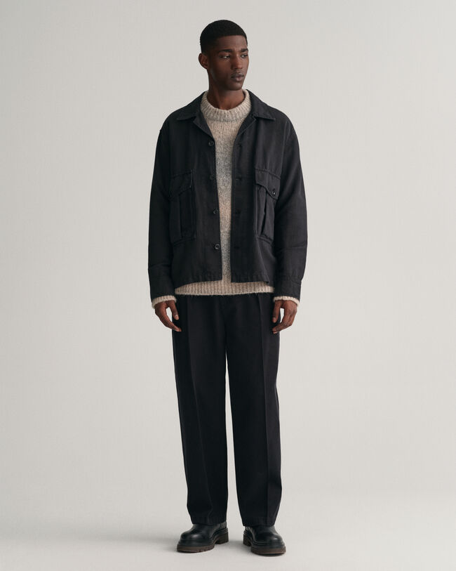 Chino met plooien van keperstof