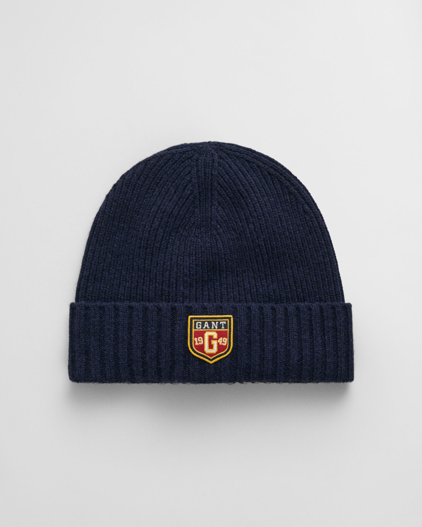 Wollen beanie met badge