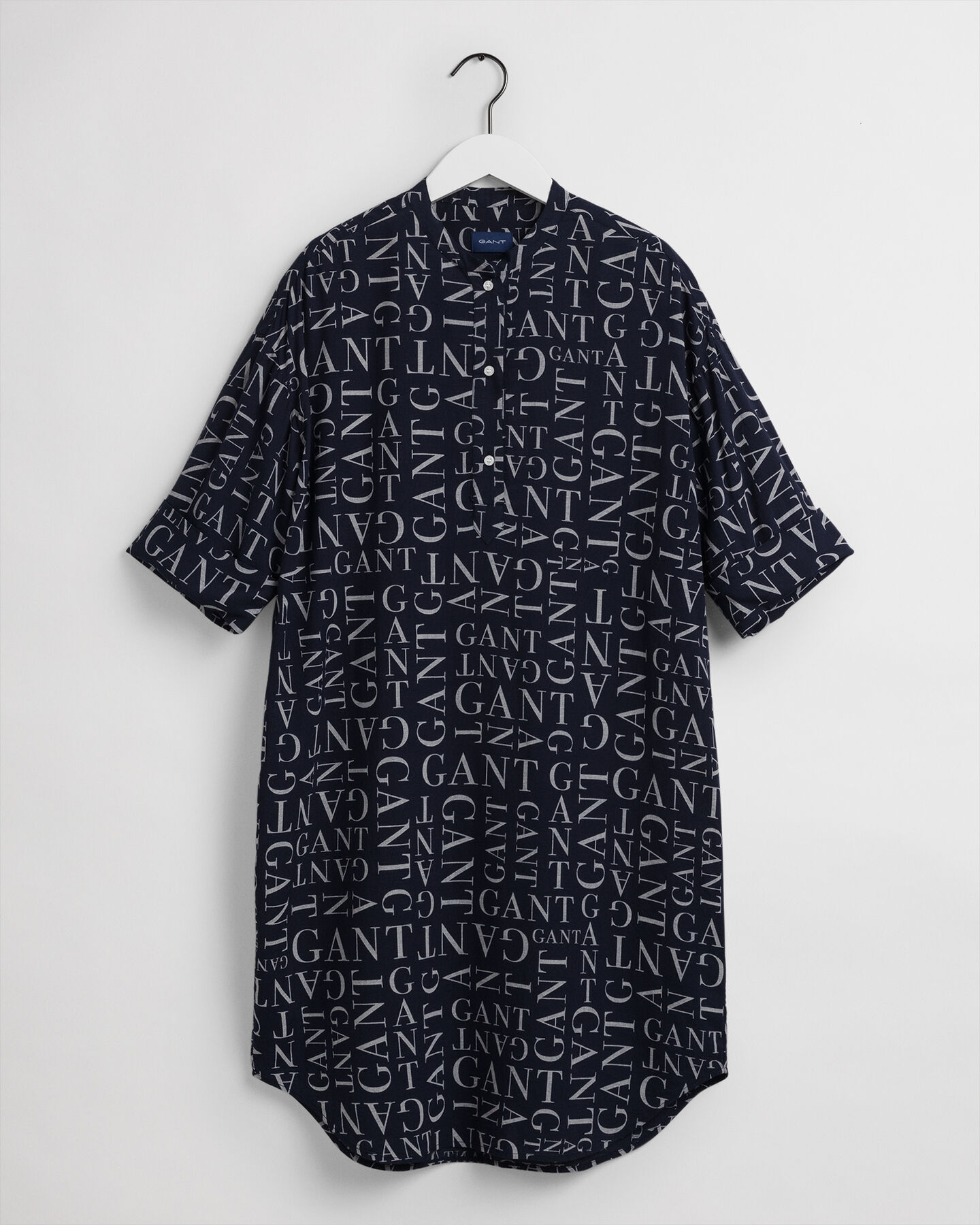 Tuniek met typografische print