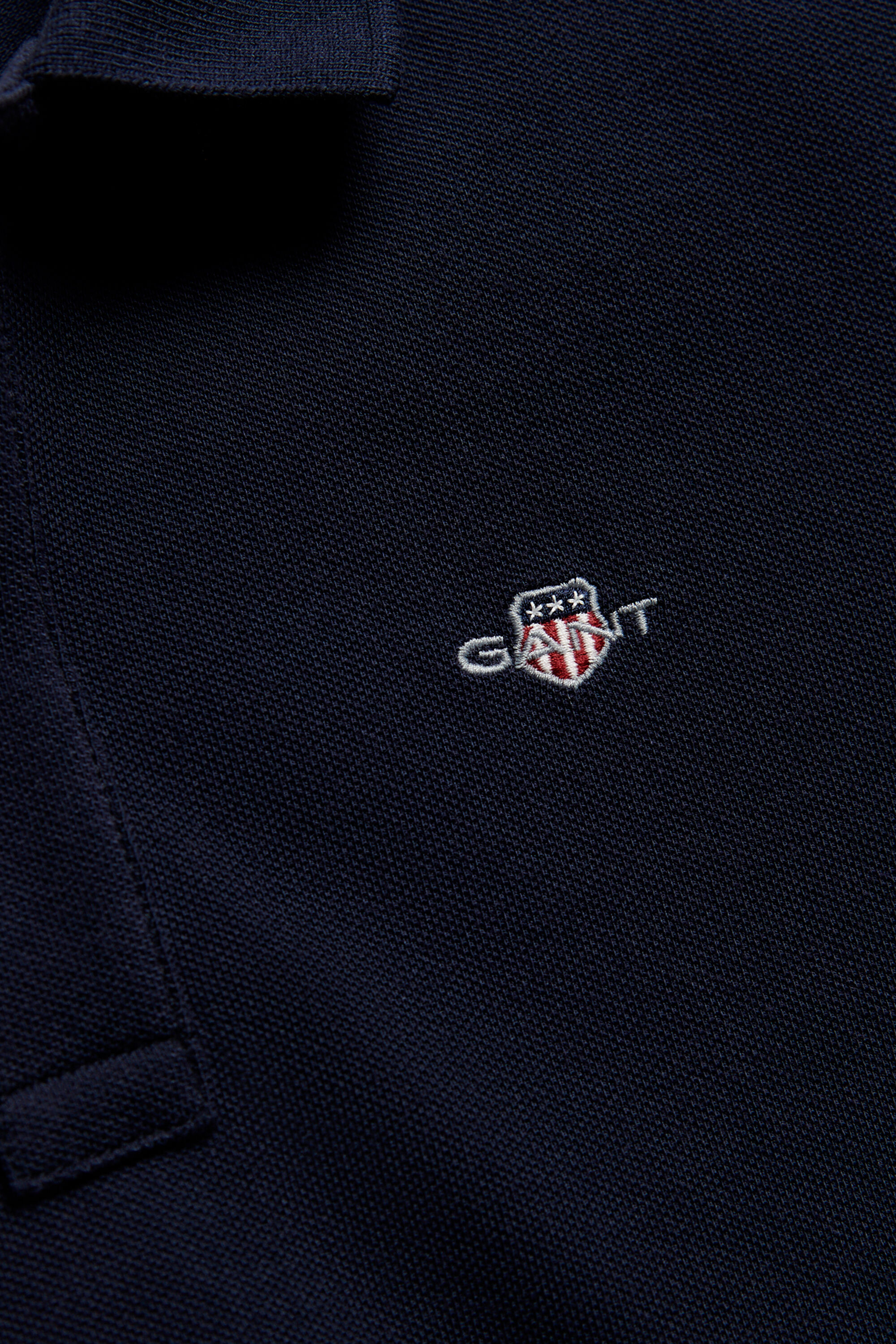 Poloshirt met schild voor tieners