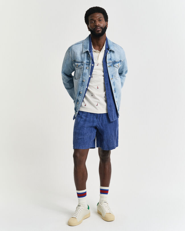 Graphic poloshirt met geborduurde boot