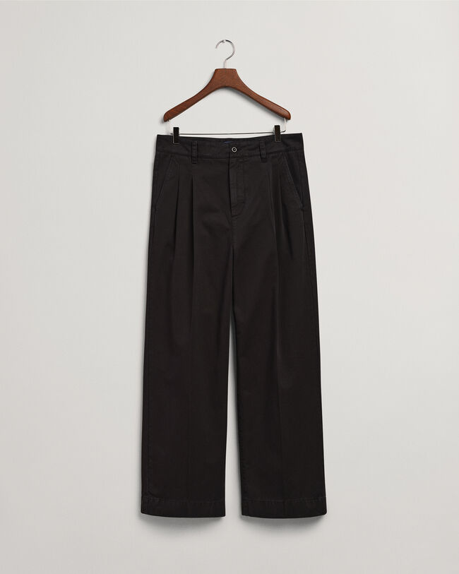 Volume chino met plooien