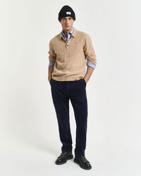 Kabelgebreide polotrui van lamswol