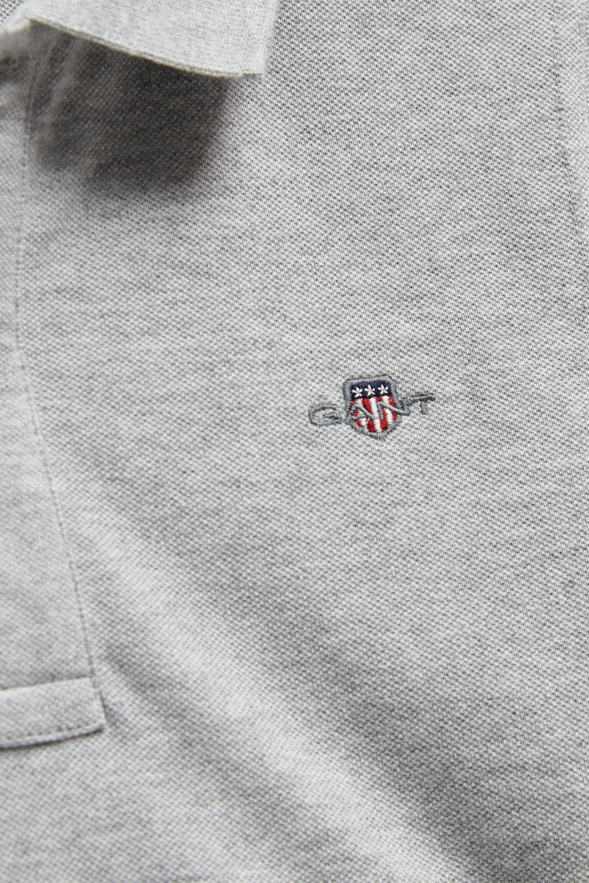 Teens Shield piqué poloshirt