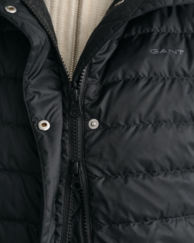 Lichte, lange donsbodywarmer