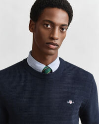 Gebreide trui met minikabels en ronde hals