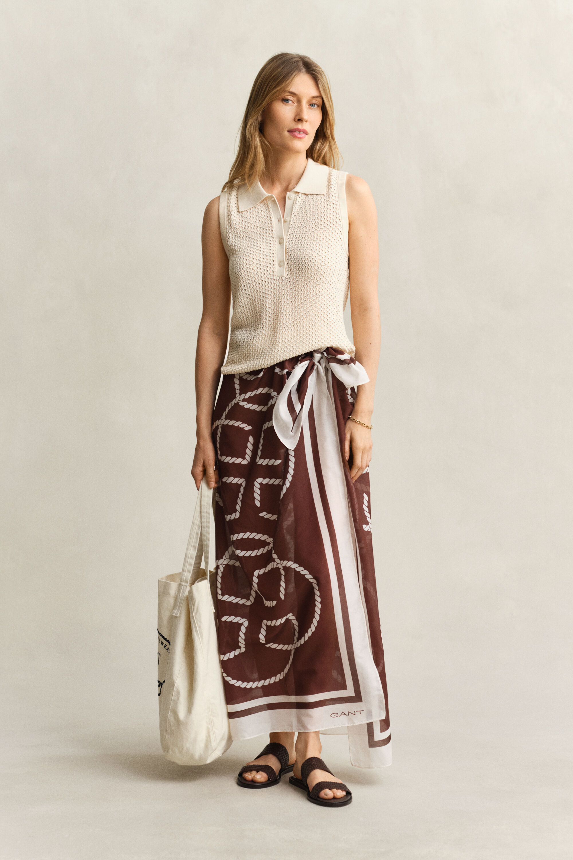 Mouwloze gebreide top met kanttextuur