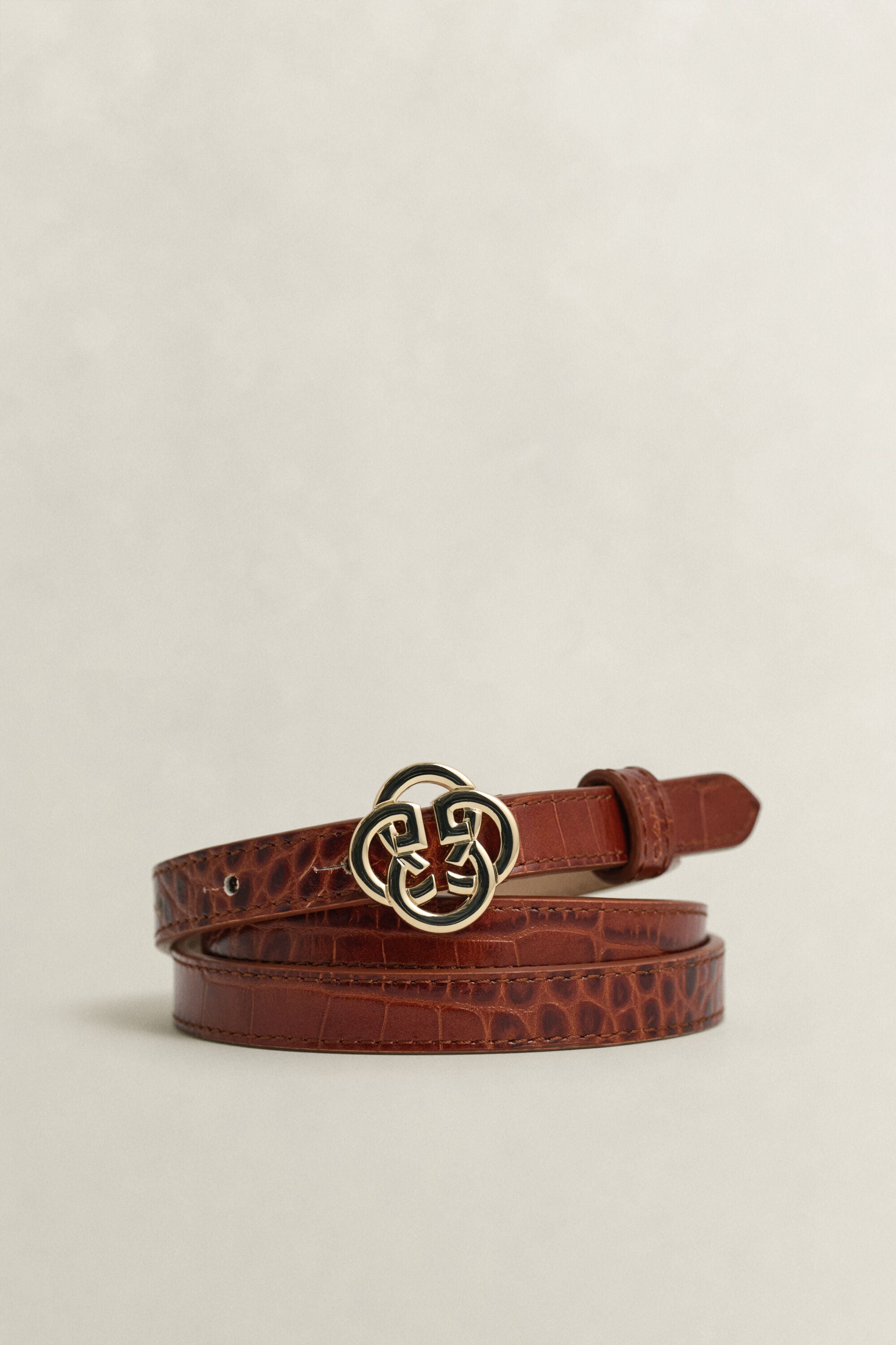 Riem met krokodillenlook en monogram