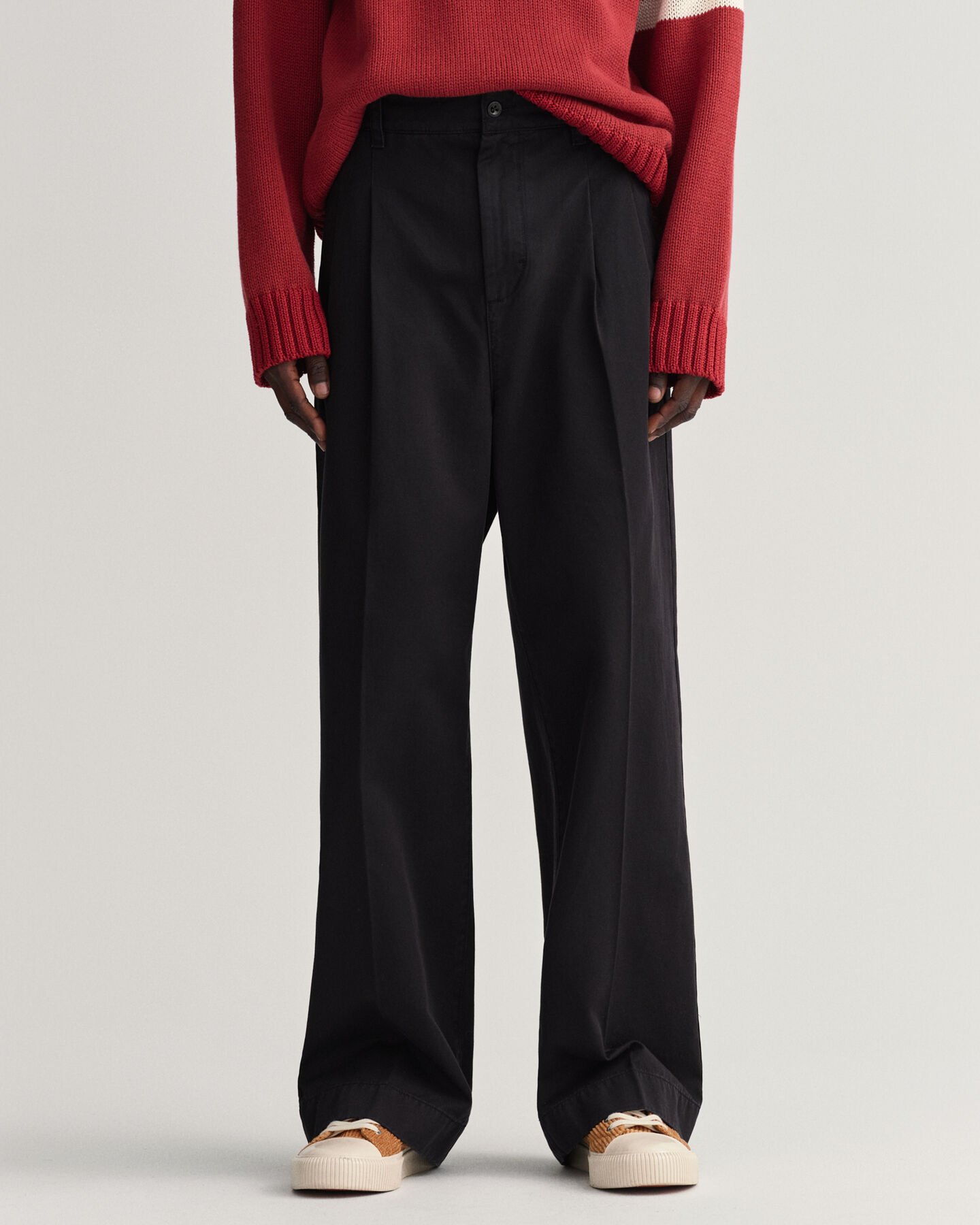 Volume chino met plooien