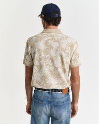 Poloshirt met tropische print