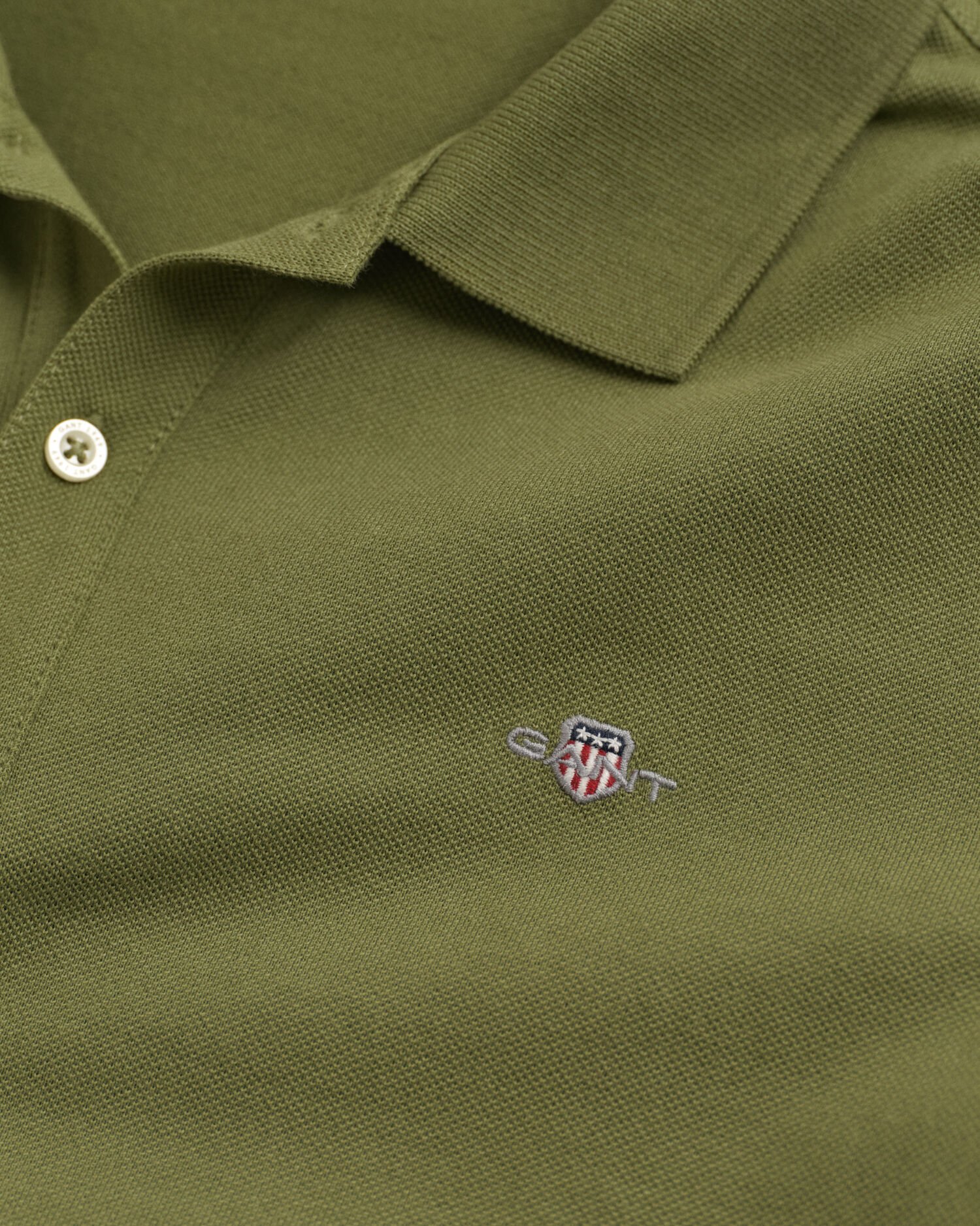 Teens Shield piqué poloshirt