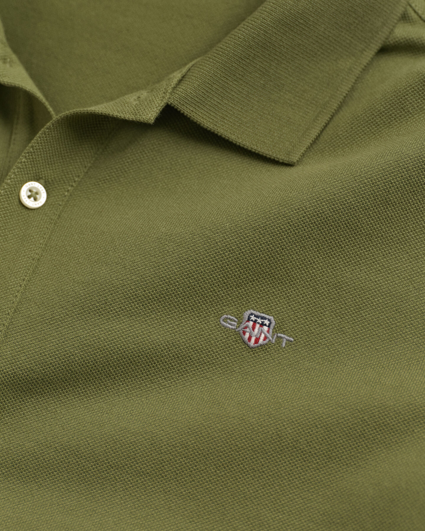 Teens Shield piqué poloshirt