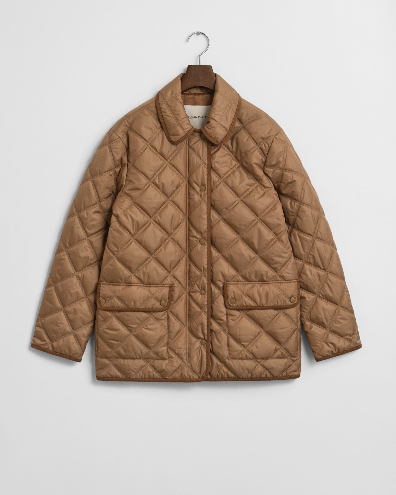 Gewatteerd jack met corduroy details